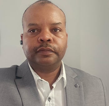 Portrait of Rayhaan Omar, Associate.